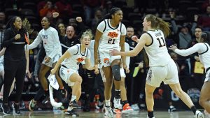 Terryn Milton hits buzzer-beater to send Oklahoma State past WVU in Big 12 tournament